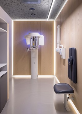 Innenarchitektur Zahnarztpraxis Darmstadt - moderner Röntgenraum mit Holzverkleidung und indirekter Beleuchtung 